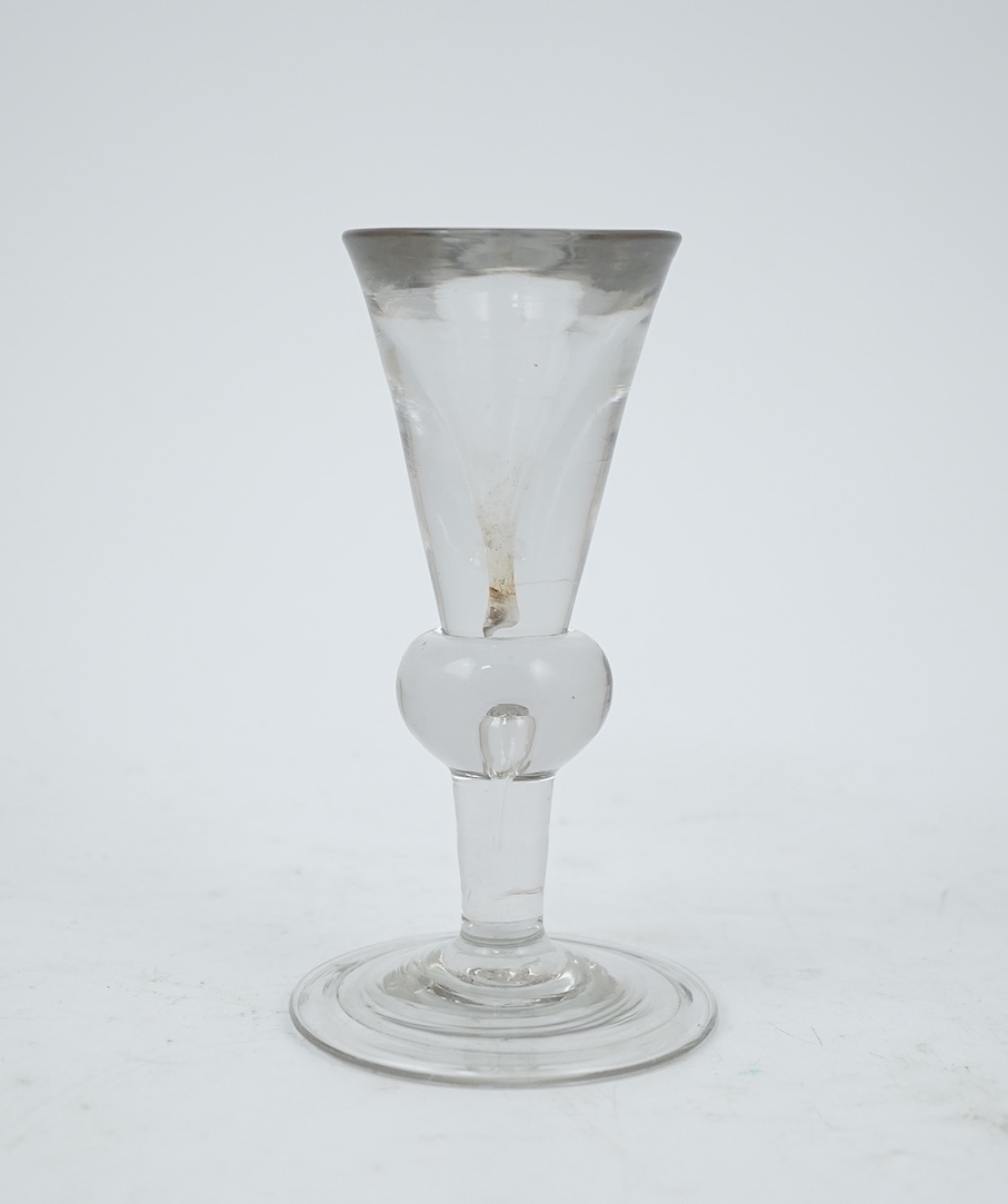 A heavy baluster toastmaster's glass, circa 1715-1720